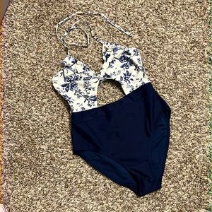 Tie halter one piece with cutouts